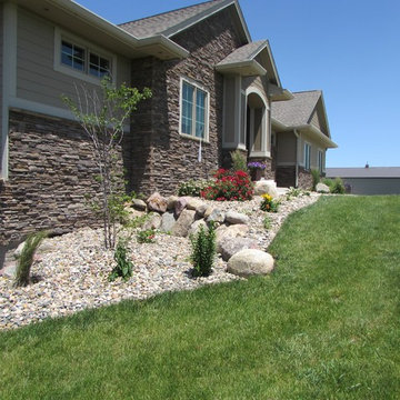 Boulder Walls and Flower Beds