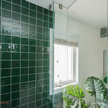 Vibrant Green Ceramic Tiles Bring Life to a Hallway Bathroom
