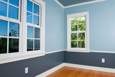 Example of a transitional bedroom design in Charlotte