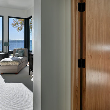 Contemporary Sharp Glassy Lakefront Wooden Exterior