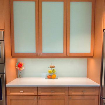 Seaside inspired Kitchen with custom Back painted glass backsplash and cabinets