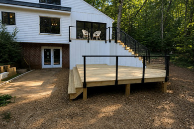 Inspiration for a large modern deck remodel in Richmond