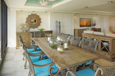 Design ideas for a beach style dining room in Tampa.