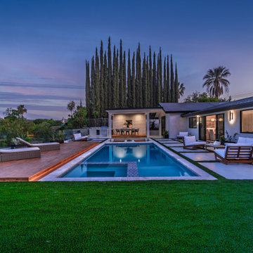 Pool and Spa Lit from the Lawn After Sunset