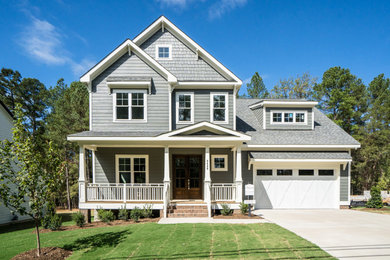 Inspiration for a large craftsman gray two-story exterior home remodel in Raleigh