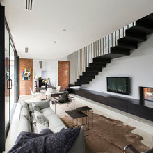 great room feature wall stair case