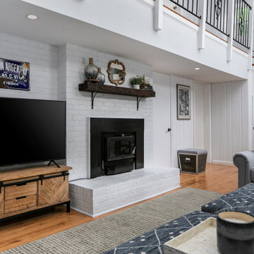 White Vaulted Ceiling Family Room