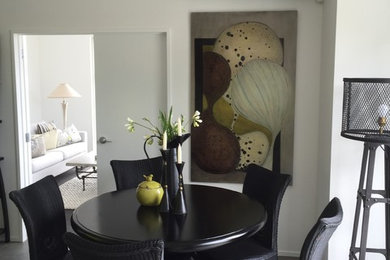 This is an example of a contemporary dining room in Auckland.
