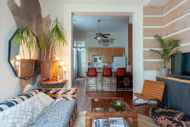 Example of an eclectic living room design in New Orleans