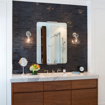 Master bath renovation with dark zellige subway tile
