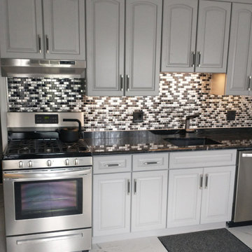 Eden Mosaic Tile Installations: STAINLESS STEEL AND CRACKLED GLASS MOSAIC TILE