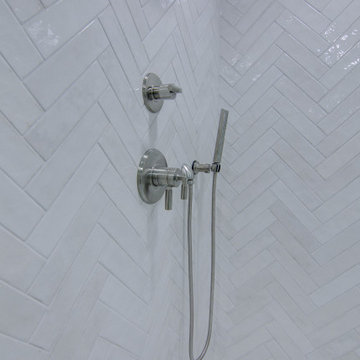Modern Bathroom Remodel with Sleek Nickel Finishes and Hex Tile Details