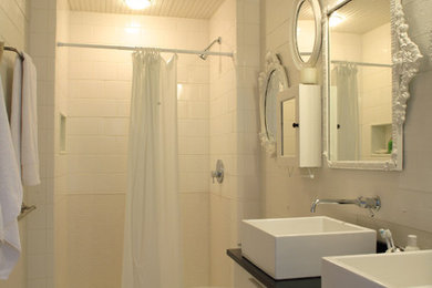 This is an example of a modern bathroom in New York with a vessel sink.