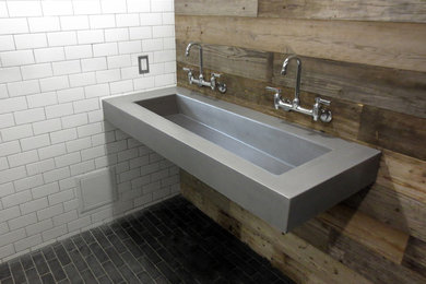 Mid-sized trendy bathroom photo in New York with a wall-mount sink