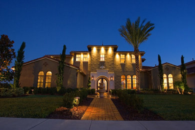 Large mediterranean home design in Orlando.