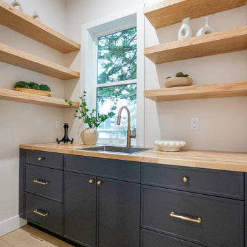 Butler's Pantry with Butcher Block, Charcoal Cabinets and Oak Shelves – Bothell
