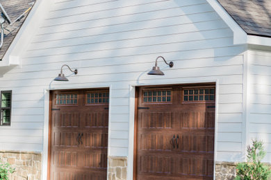 Inspiration for a mid-sized country attached two-car carport remodel in Atlanta