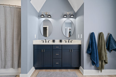 Example of a mid-sized trendy bathroom design in DC Metro with a built-in vanity
