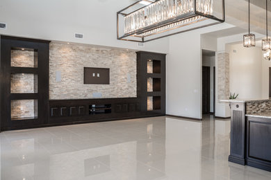 Inspiration for a mid-sized transitional open concept marble floor living room remodel in Austin with white walls and a wall-mounted tv