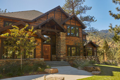 Rustic exterior home idea in Los Angeles