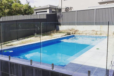 Photo of a small contemporary pool in Sydney.