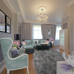 Foto di un piccolo soggiorno minimalista aperto con angolo bar, pareti grigie, pavimento in legno massello medio e TV a parete