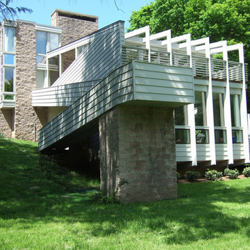 Greenwich modern home with Le Corbusier Villa Savoye inspired ramp