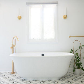 Free Standing Soaking Tub with Brass Accents