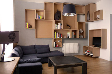 Design ideas for a modern family room in Angers.