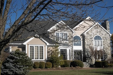 Inspiration for a small transitional brown stone exterior home remodel in New York