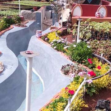 CASCADING STREAM AND WATER FOUNTAINS BY GOLDENSCAPE LANDSCAPE ARCHITECTS