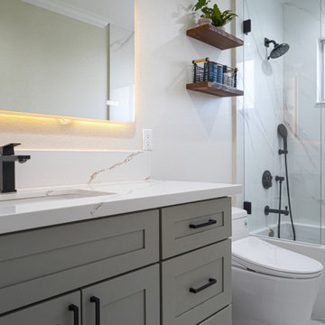 Modern Small Bathroom Remodel with Grey RTA Vanity Cabinets and Black Fixtures