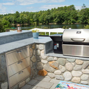 Outdoor Kitchen, Firepit, Patio, Stairs, Retaining Wall and Flowerbeds