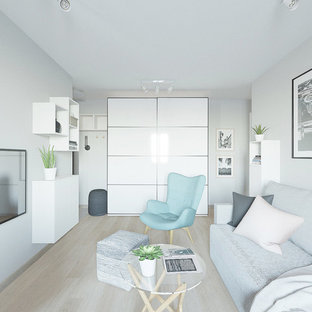 Design ideas for a small scandinavian open plan living room in Other with grey walls, laminate floors, a wall mounted tv and pink floors.
