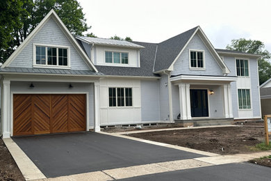 Inspiration for a farmhouse exterior home remodel in Toronto
