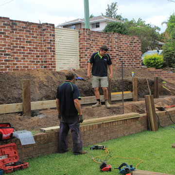 Retaining wall with garden beds