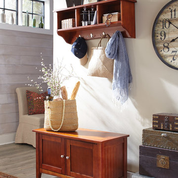 Cottage Style Mudroom Featuring Cherry Finish Storage Bench and Coat Hook