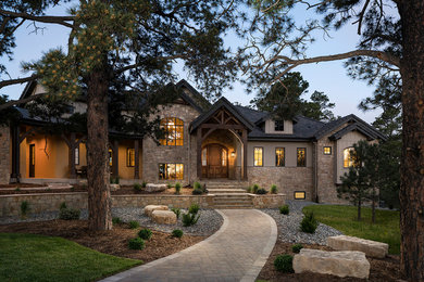 Inspiration for a transitional exterior home remodel in Denver