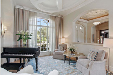 Photo of a mid-sized traditional enclosed living room in Orlando with a music area and beige walls.