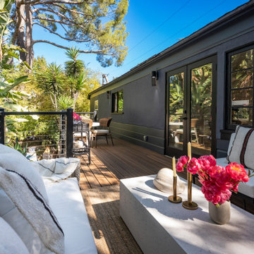 Celebritity IOU backyard deck featuring Spiced Teak composite decking with A310