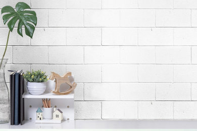 Inspiration for a contemporary brick wall kids' room remodel in Montreal with white walls