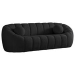 Meridian Furniture - Elijah Boucle Fabric Upholstered Sofa, Black - Sit back and relax in casual style when you bring home this Elijah boucle fabric sofa. Inspired by the unmistakably relaxed vibe created by a classic bean bag, this inviting sofa features a rounded design with deep channel tufting for added support and resilience. It comes with an accent pillow for even more welcoming comfort, and the sofa is upholstered all over with rich black boucle fabric that beckons you to sit, rest, and take it easy.