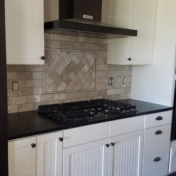 Absolute Black granite kitchen by The Beveled Edge