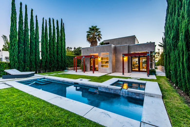 Trendy backyard rectangular lap hot tub photo in Los Angeles