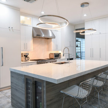 Modern Open-Concept Kitchen with Quartz Waterfall Island