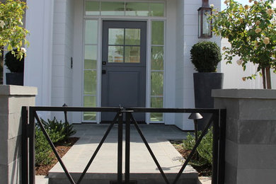 Inspiration for a transitional exterior home remodel in Orange County