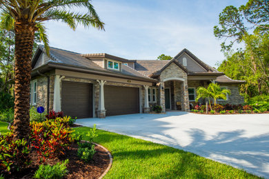 Inspiration for a large craftsman two-story exterior home remodel in Orlando