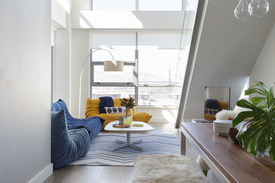 Inspiration for a contemporary living room in San Francisco with white walls.