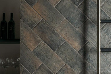 Example of a tuscan wine cellar design in Seattle