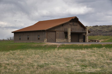 Photo of a large country detached three-car garage in Denver.